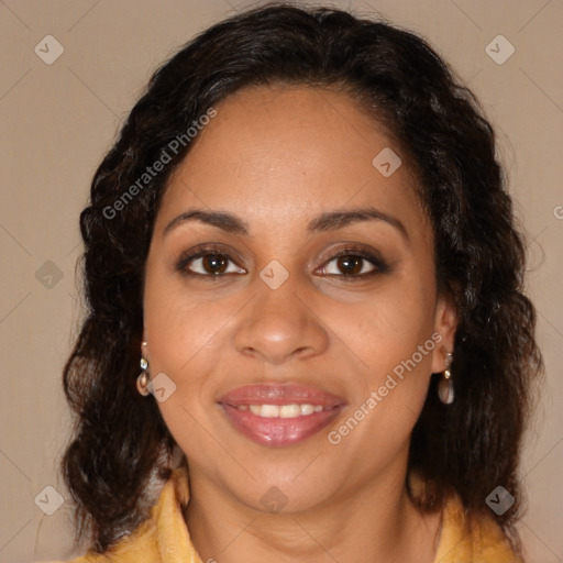 Joyful black adult female with medium  brown hair and brown eyes