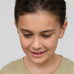 Joyful white child female with short  brown hair and brown eyes