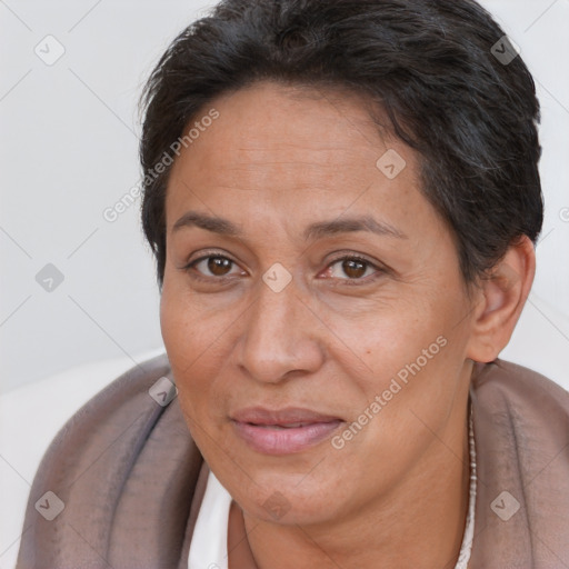 Joyful white adult female with short  brown hair and brown eyes