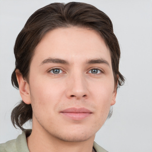 Neutral white young-adult male with medium  brown hair and grey eyes