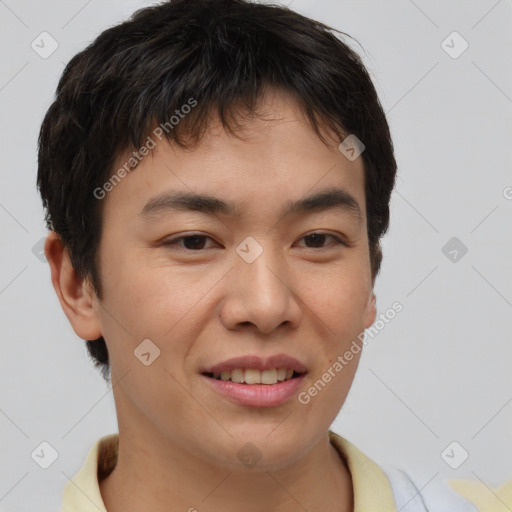Joyful asian young-adult male with short  brown hair and brown eyes
