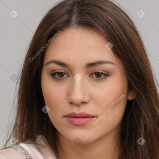 Neutral white young-adult female with long  brown hair and brown eyes