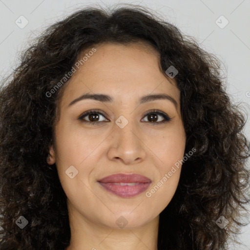 Joyful latino young-adult female with long  brown hair and brown eyes