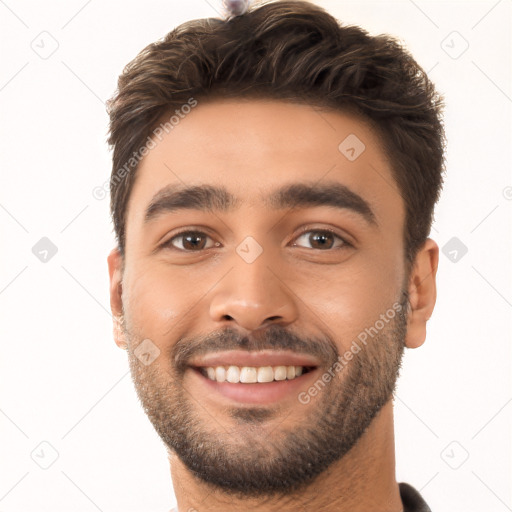 Joyful white young-adult male with short  brown hair and brown eyes