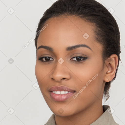 Joyful latino young-adult female with long  brown hair and brown eyes