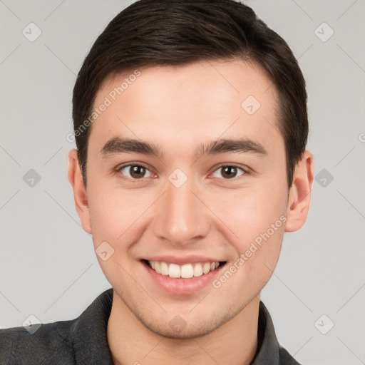 Joyful white young-adult male with short  brown hair and brown eyes