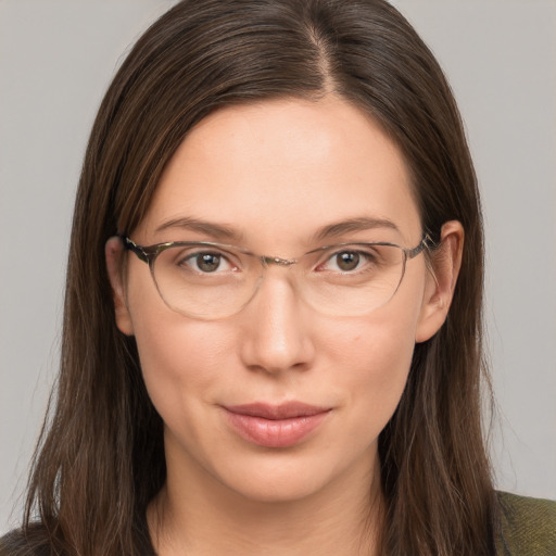 Neutral white young-adult female with long  brown hair and grey eyes