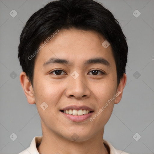 Joyful asian young-adult male with short  brown hair and brown eyes