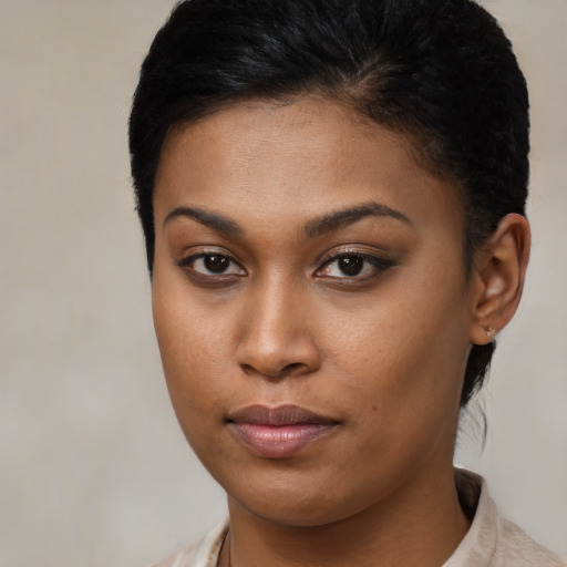 Neutral black young-adult female with short  brown hair and brown eyes