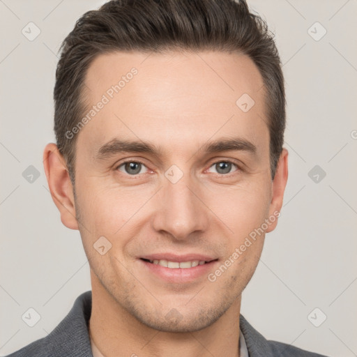 Joyful white adult male with short  brown hair and brown eyes