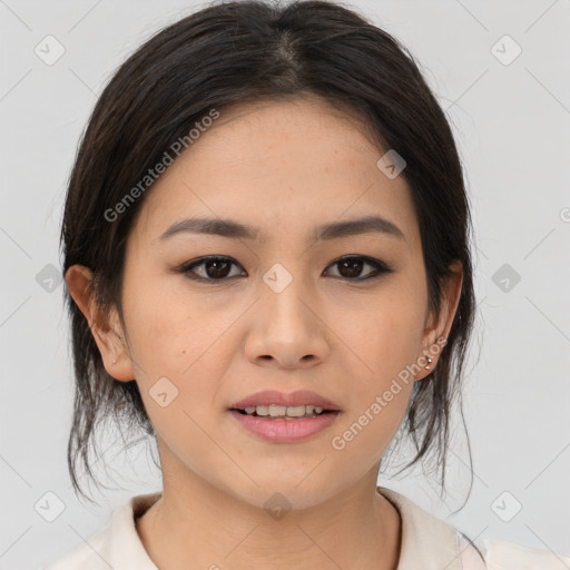 Joyful asian young-adult female with medium  black hair and brown eyes