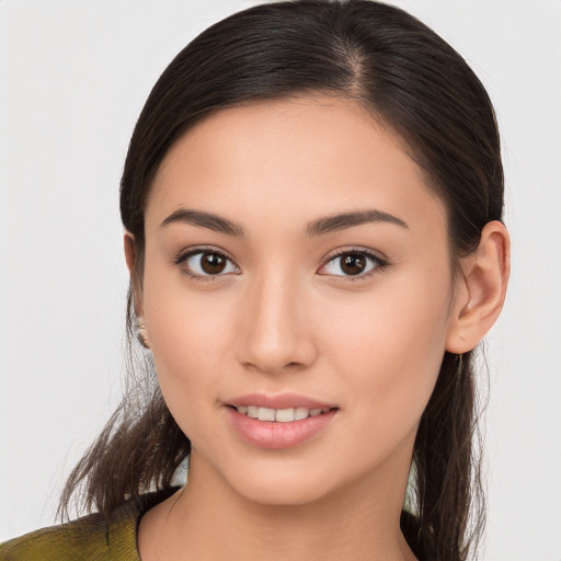 Joyful white young-adult female with long  brown hair and brown eyes