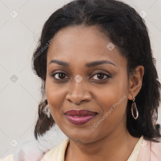 Joyful black young-adult female with medium  brown hair and brown eyes