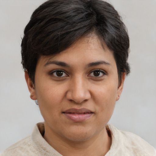 Joyful asian young-adult female with short  brown hair and brown eyes