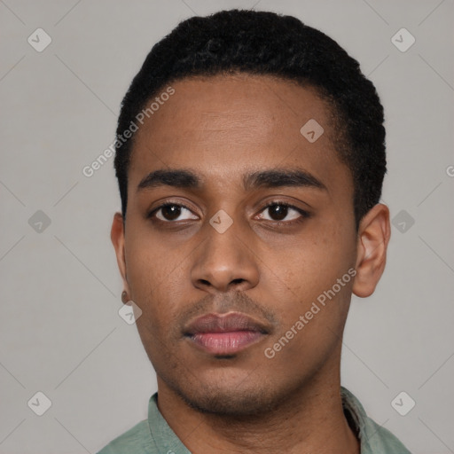 Neutral latino young-adult male with short  black hair and brown eyes