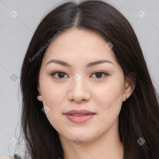 Joyful asian young-adult female with long  brown hair and brown eyes