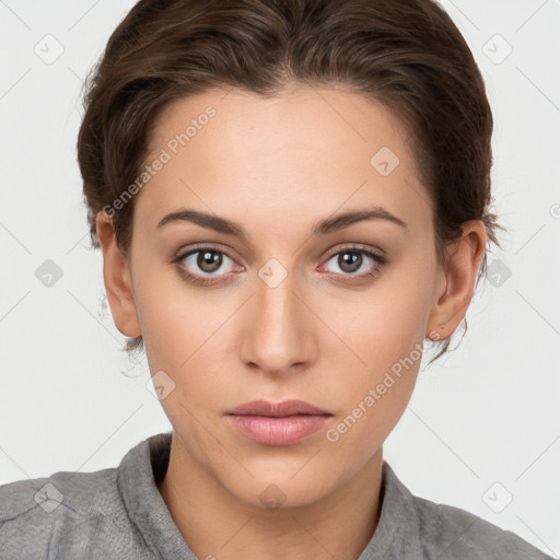 Neutral white young-adult female with short  brown hair and brown eyes