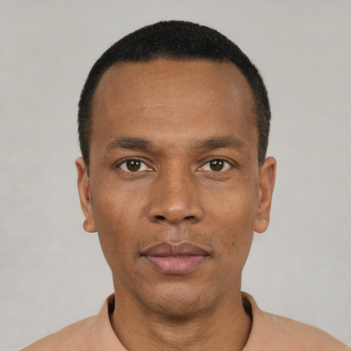 Neutral black young-adult male with short  black hair and brown eyes
