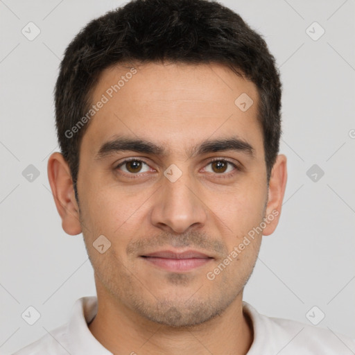 Joyful white young-adult male with short  brown hair and brown eyes