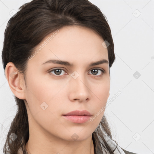 Neutral white young-adult female with long  brown hair and brown eyes