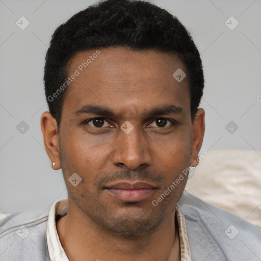 Neutral black young-adult male with short  black hair and brown eyes