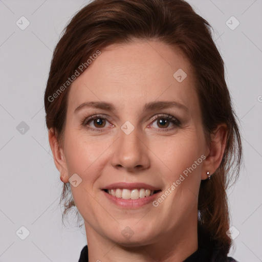 Joyful white young-adult female with medium  brown hair and grey eyes