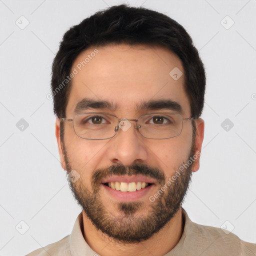 Joyful white young-adult male with short  black hair and brown eyes