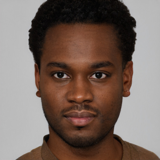 Neutral black young-adult male with short  brown hair and brown eyes