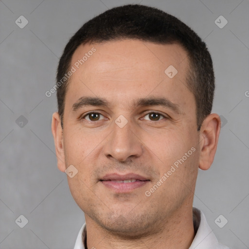 Joyful white young-adult male with short  brown hair and brown eyes