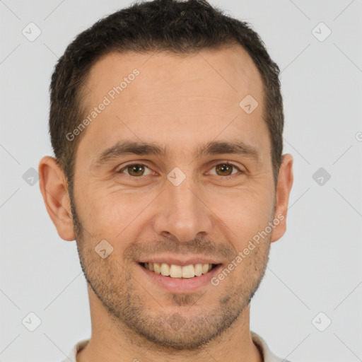 Joyful white young-adult male with short  brown hair and brown eyes