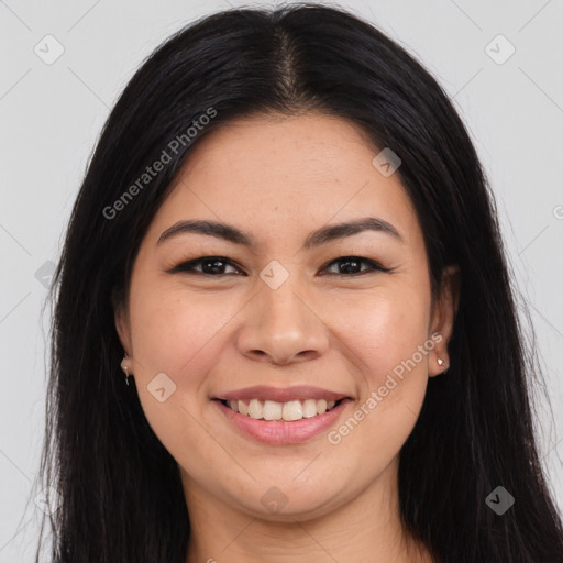 Joyful asian young-adult female with long  brown hair and brown eyes