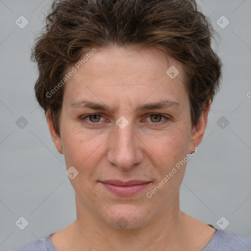 Joyful white adult female with short  brown hair and grey eyes