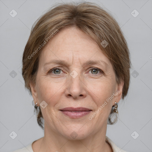 Joyful white adult female with medium  brown hair and grey eyes