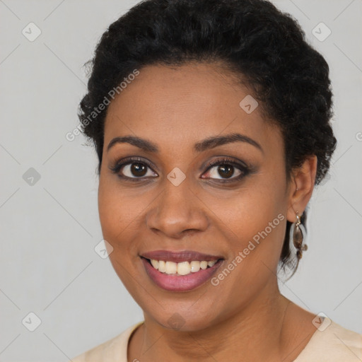 Joyful black young-adult female with short  brown hair and brown eyes