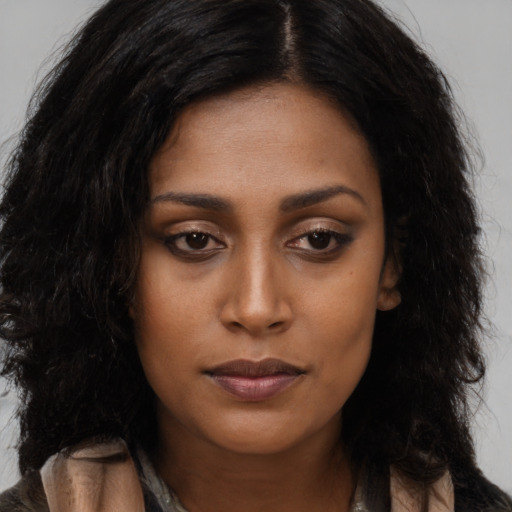 Neutral latino young-adult female with long  black hair and brown eyes