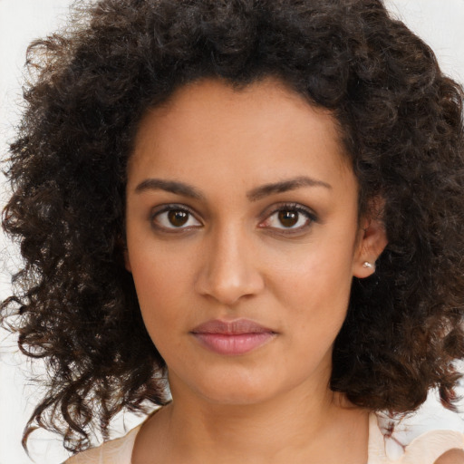 Neutral black young-adult female with medium  brown hair and brown eyes