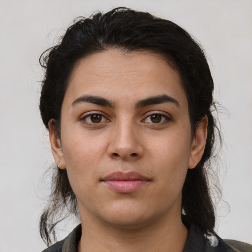 Neutral latino young-adult female with medium  black hair and brown eyes