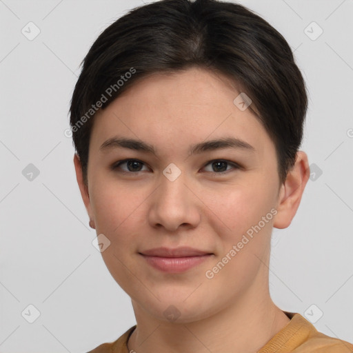 Joyful white young-adult female with short  brown hair and brown eyes