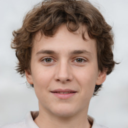 Joyful white young-adult male with medium  brown hair and brown eyes