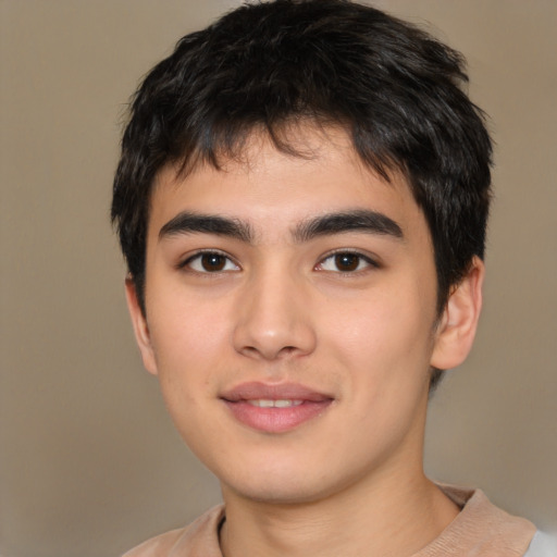 Joyful asian young-adult male with short  black hair and brown eyes
