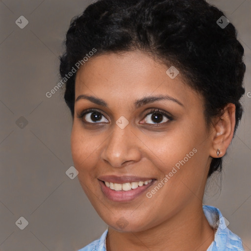 Joyful latino young-adult female with short  brown hair and brown eyes