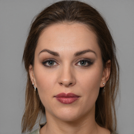 Neutral white young-adult female with long  brown hair and brown eyes