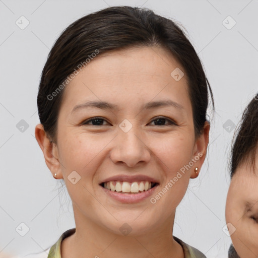 Joyful white young-adult female with medium  brown hair and brown eyes