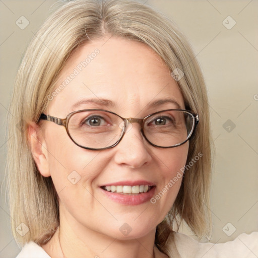 Joyful white adult female with medium  brown hair and blue eyes