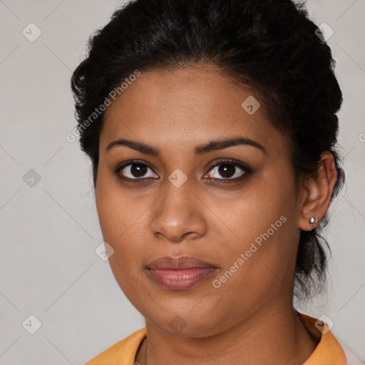 Joyful black young-adult female with medium  brown hair and brown eyes