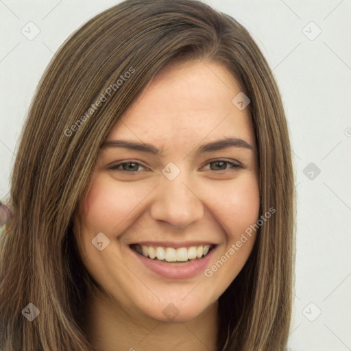 Joyful white young-adult female with long  brown hair and green eyes