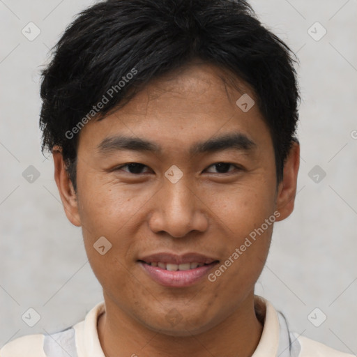 Joyful asian young-adult male with short  brown hair and brown eyes