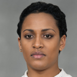 Neutral latino young-adult female with short  black hair and brown eyes