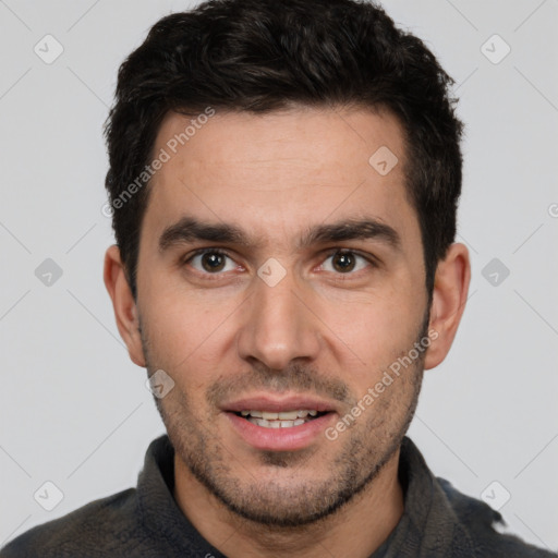 Joyful white young-adult male with short  black hair and brown eyes