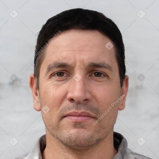 Neutral white adult male with short  brown hair and brown eyes